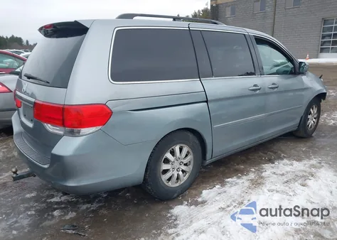 2010 Honda Odyssey Ex-L z USA, uszkodzony, nr VIN 5FNRL3H78AB028584